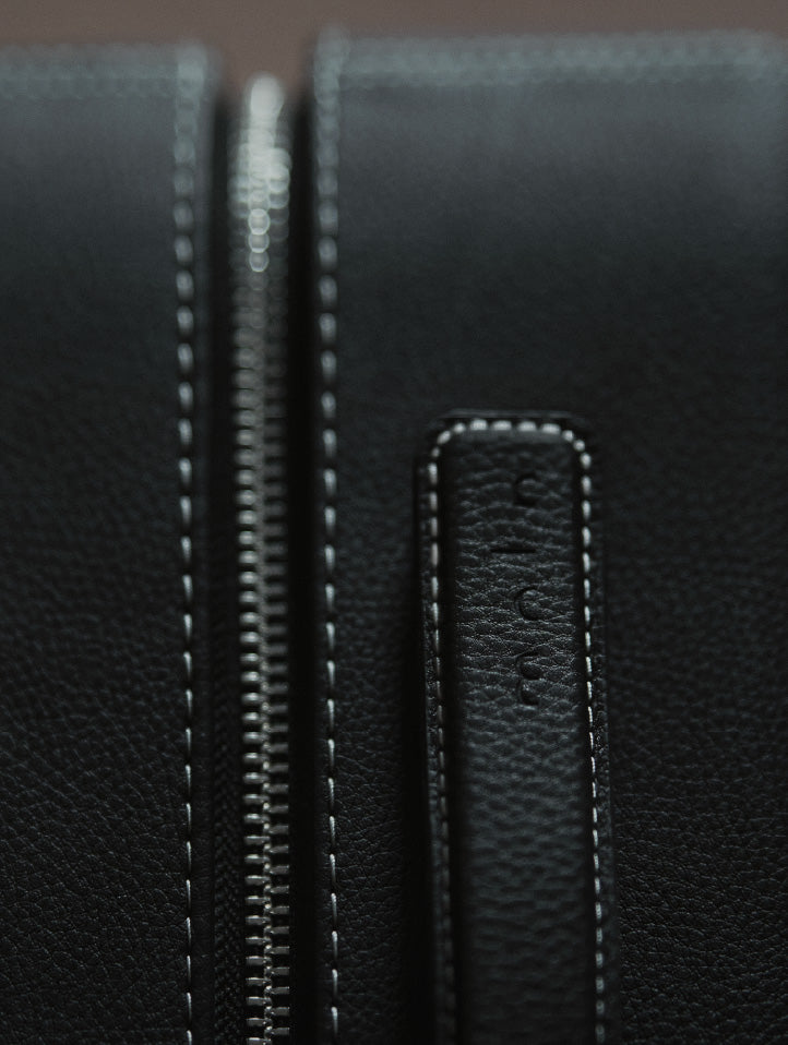 Stitching and zipper detail on Grain